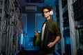 Smart teenager student having internship in modern data center - PhotoDune Item for Sale
