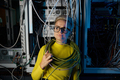 Portrait of tired overwhelmed female IT engineer at server room - PhotoDune Item for Sale