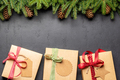 Xmas fir tree branch, Christmas gift boxes and space - PhotoDune Item for Sale