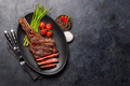 Medium rare grilled Tomahawk beef steak with asparagus - PhotoDune Item for Sale