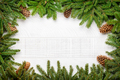 Christmas fir tree branch frame over white wood - PhotoDune Item for Sale