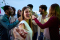 POV young smiling Caucasian woman holding hands boyfriend at party. Attractive girl looking cheerful - PhotoDune Item for Sale