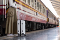 Alone Asian woman traveler with suitcase in train station platform. Summer vacation holiday and - PhotoDune Item for Sale