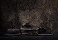 Set of different craft plates and bowls on dark background - PhotoDune Item for Sale