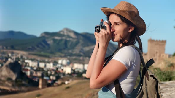 Enthusiastic Young Hipster Woman Taking Photography Mountain Nature Using Professional Camera