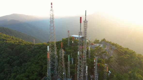 Antenna Towers on the Background of Mountains