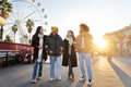 Group of friends walking around the amusement park at daylight. Friends meeting hanging out together - PhotoDune Item for Sale