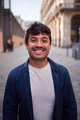 Vertical portrait of happy young Latin man happy smiling face on street. Male people cheerful. - PhotoDune Item for Sale