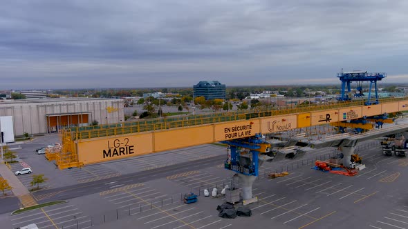 4K camera drone view of the construction site of the REM (Metropolitan Express Network) in Montreal.