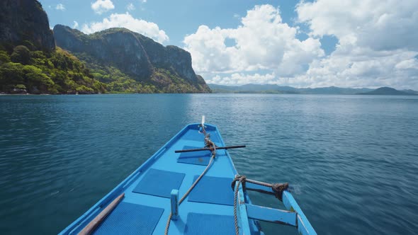 Boat Hover Over Water Surface Facing Tropical Islands El Nido, Palawan, Philippines. Steep Mountains