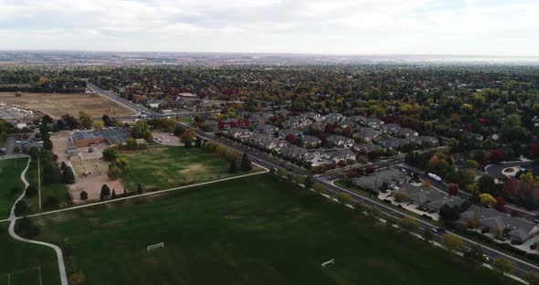 The city of Greeley Colorado during fall colors. A drone flight looking over the north western part