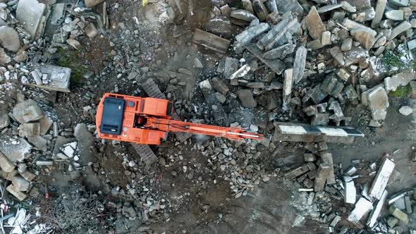 Industrial Recycling of Concrete, Hydraulic Excavator Doosan 255 LCV with Jaw Crusher at Work