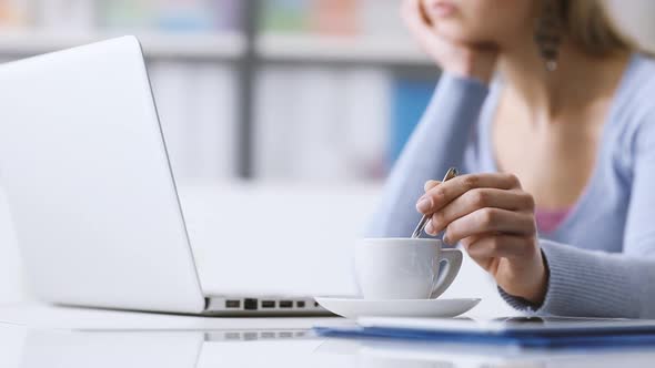 Woman having a coffee break