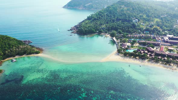 Koh Phangan Aerial - two islands connected with the sandbar in the turquoise crystal clear seawater