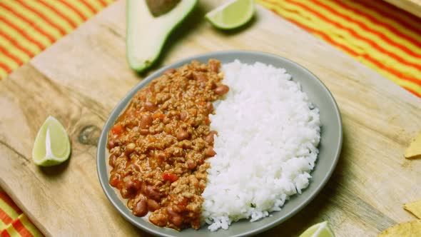 I Add a Few Slices of Avocado to the Chili Con Carne and Rice
