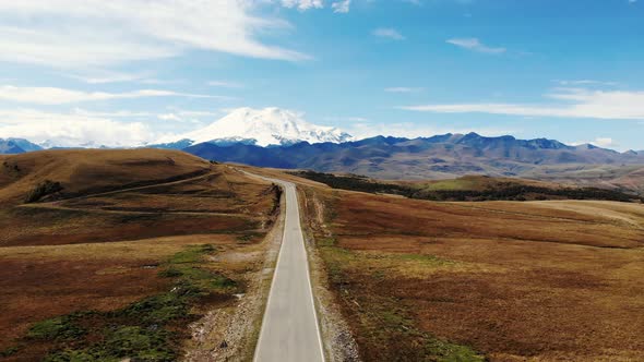 Aerial View of Amazing Road with View of the Caucasian Ridge and Mount Elbrus