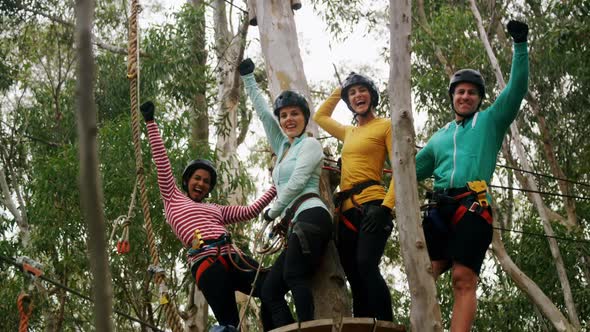 Group of woman and trainer walking on the logs 4k