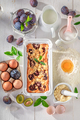 Ingredients for delicious plum cake with fruits and crumble. - PhotoDune Item for Sale