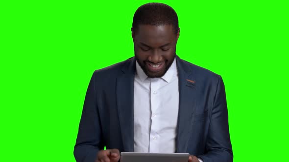 Smiling Afro American Man with Digital Tablet.