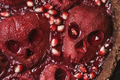 Halloween food. Close-up of homemade pie with jam and scary skull-shaped pears. - PhotoDune Item for Sale