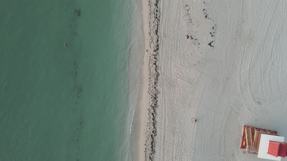 Cinematic View From the Drone to the Sandy Beach