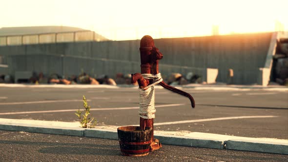 Old Rusty Water Pump at Sunny Day