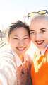 POV selfie of happy interracial lesbian couple. People together enjoying homosexual relationship. - PhotoDune Item for Sale