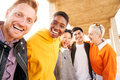 Portrait of multiracial group of friends hugging and looking camera. Smiling people having fun - PhotoDune Item for Sale