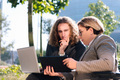 businessman and businesswoman working outdoors - PhotoDune Item for Sale