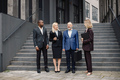 Business people standing and talk to each other in front of modern office - PhotoDune Item for Sale