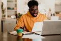 A focused african american student is sitting at home - PhotoDune Item for Sale