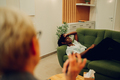 Desperate african american woman is having a session with psychotherapist - PhotoDune Item for Sale