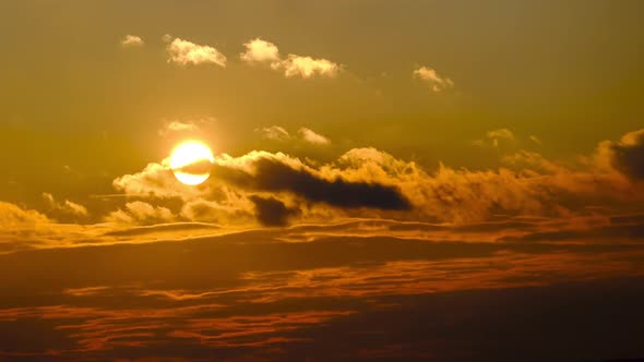 Majestic Timelapse of Dramatic Red Sunset Sky Over the Horizon