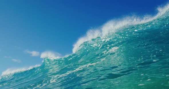 Amazing blue ocean wave breaking