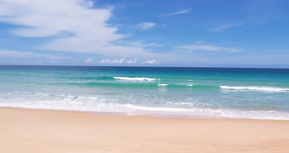 Blue sea sky and wave splashing beach summer .