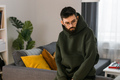 Sad man pondering about his life after a relationship breakup or bipolar disorder copy space - - PhotoDune Item for Sale