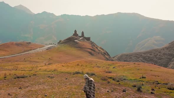 Fast Motion Fly Over Female Tourist In Kazbegi National Park