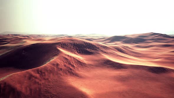 Sunset Over the Sand Dunes in the Desert