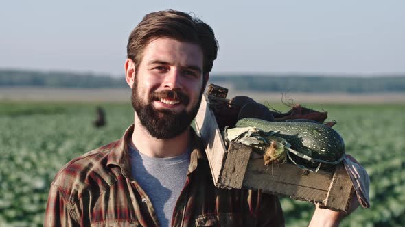 Young Farmer with Fresh Harvest