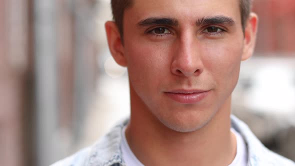 Close-up portrait of smiling attractive caucasian man