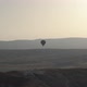 Large Hot Air Balloon Silhouette Flies Over Misty Landscape - VideoHive Item for Sale