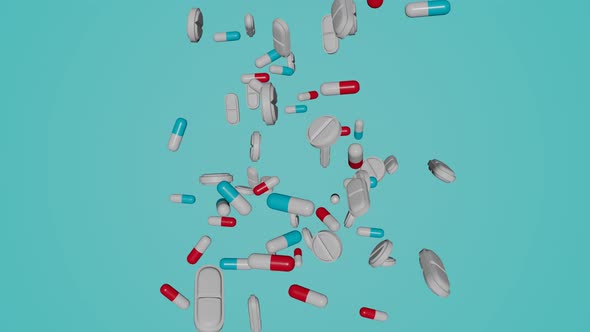 Many pills falling down on blue background.