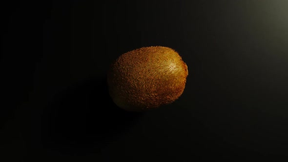 Kiwi Rotates On A Black Surface