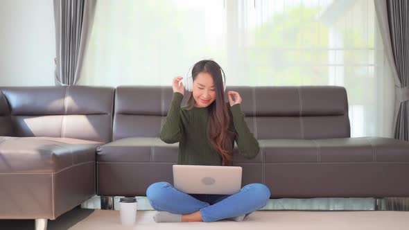 Young asian woman use laptop