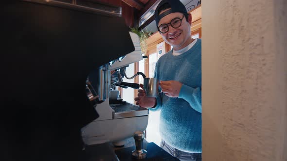 Barista Prepares Coffee in the Real Cafe