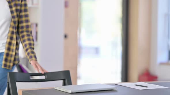 Attractive Mixed Race Woman Coming Back Opening Laptop