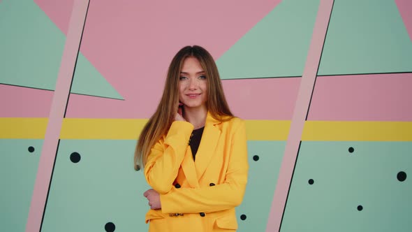 Portrait of Young Woman In Yellow Jacket