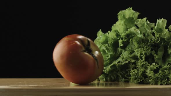 Slow-motion of Tomato Hitting Lettuce