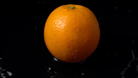 Falling of Orange in Water