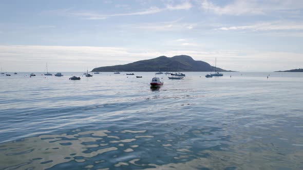 A Small Passenger Ferry Returning to Port